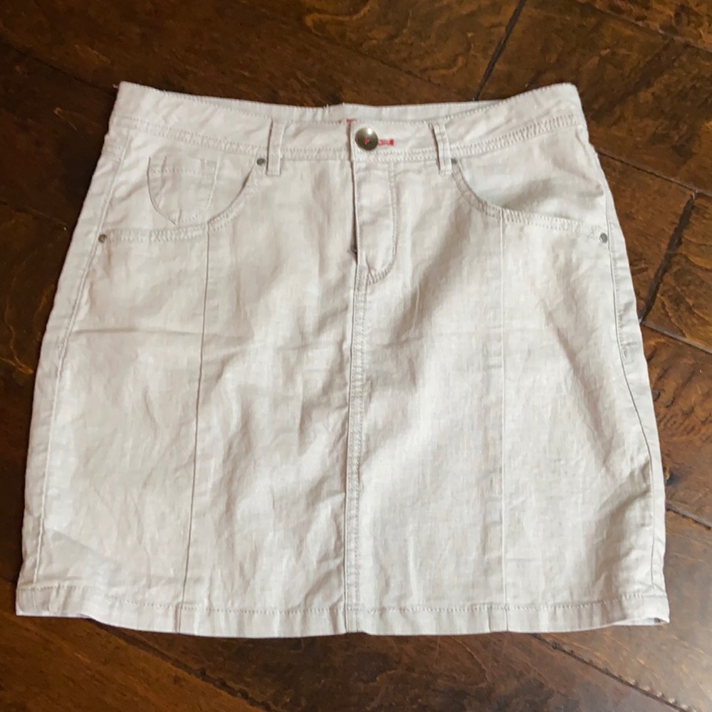 Worn jeans khaki skirt